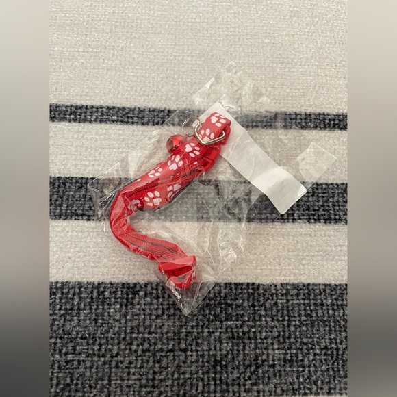 Collar with White Paw Print Pattern and Matching Bell and Buckle - Picture 13 of 15